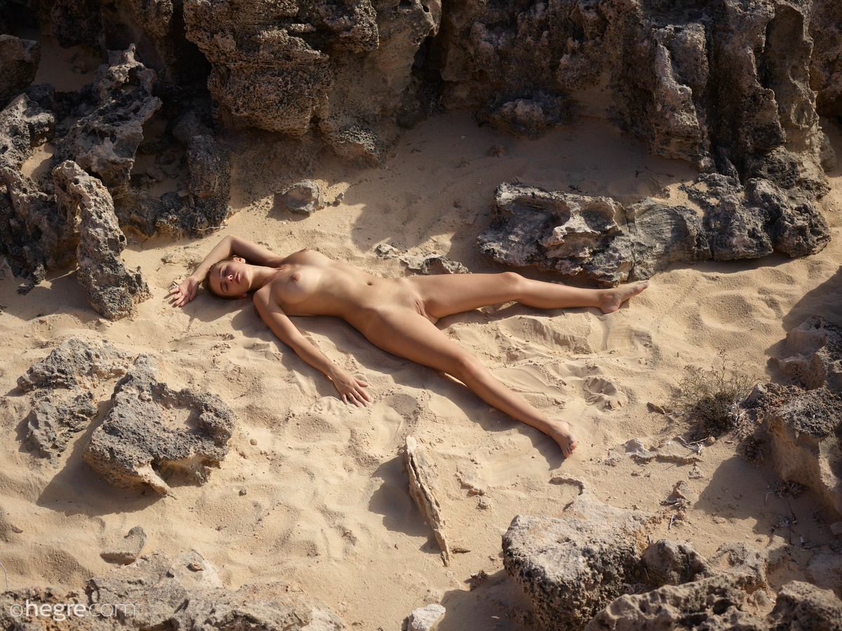 Alisa Lying in the Sand