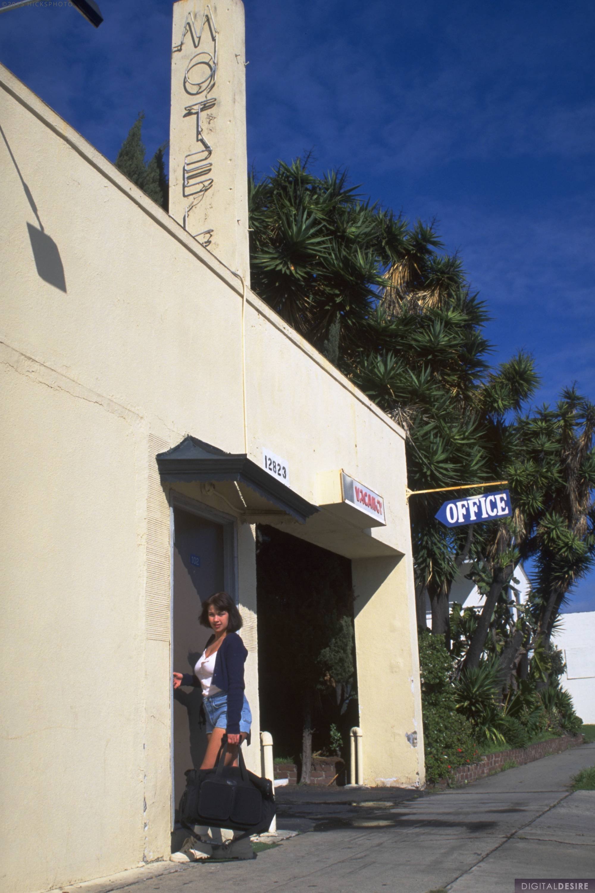 Busty Kira Getting Nude at a Motel