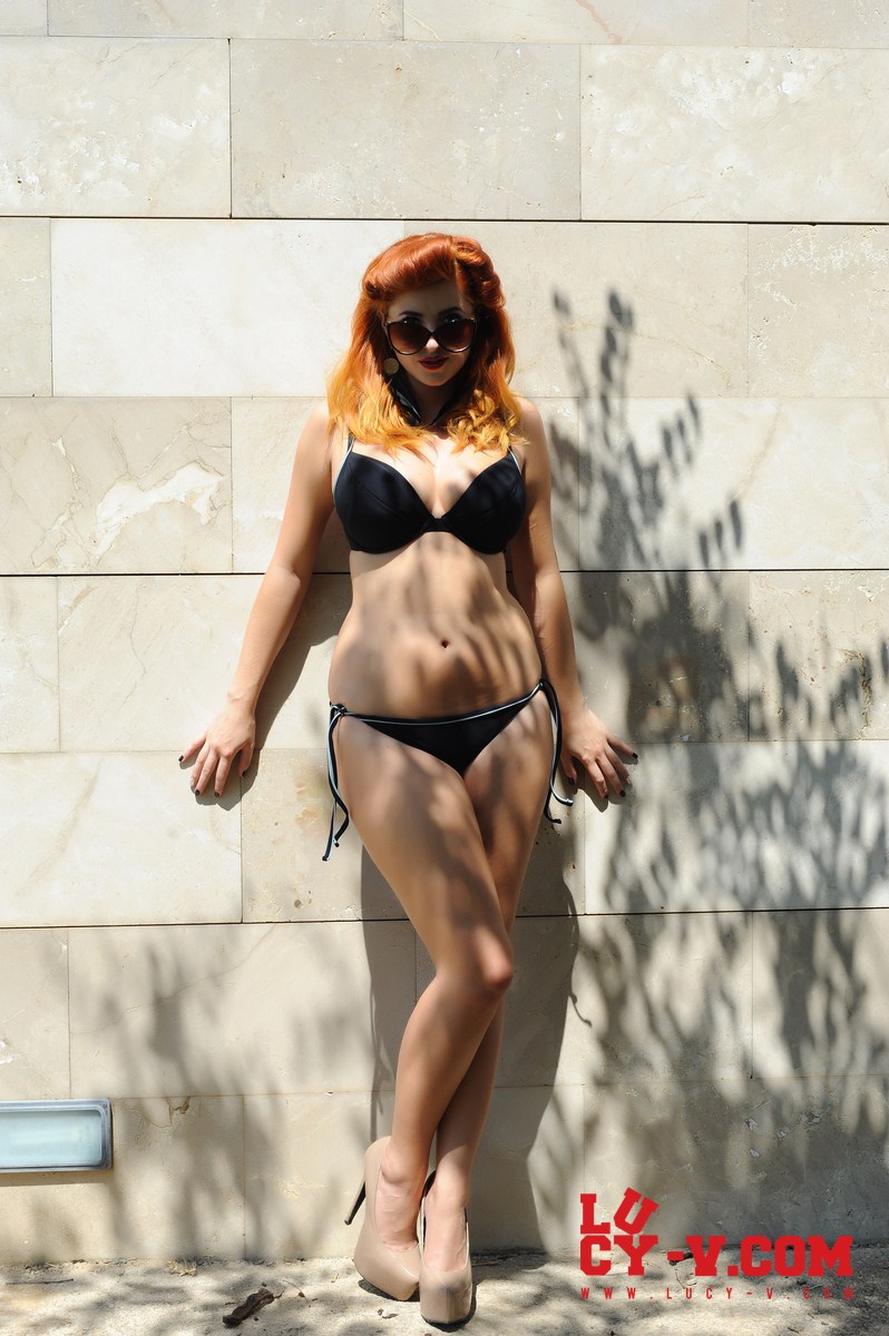 Lucy Vixen Strips in the Sun