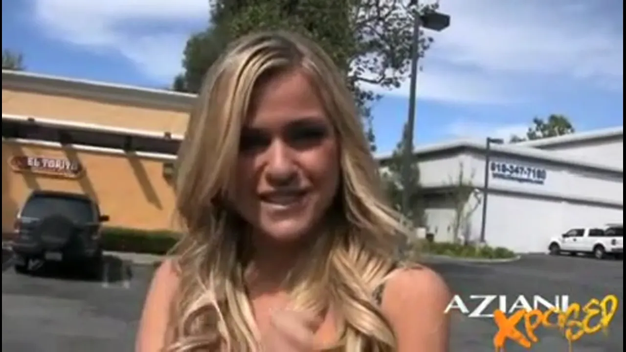 Blonde Flashes at Gas Station; Mall