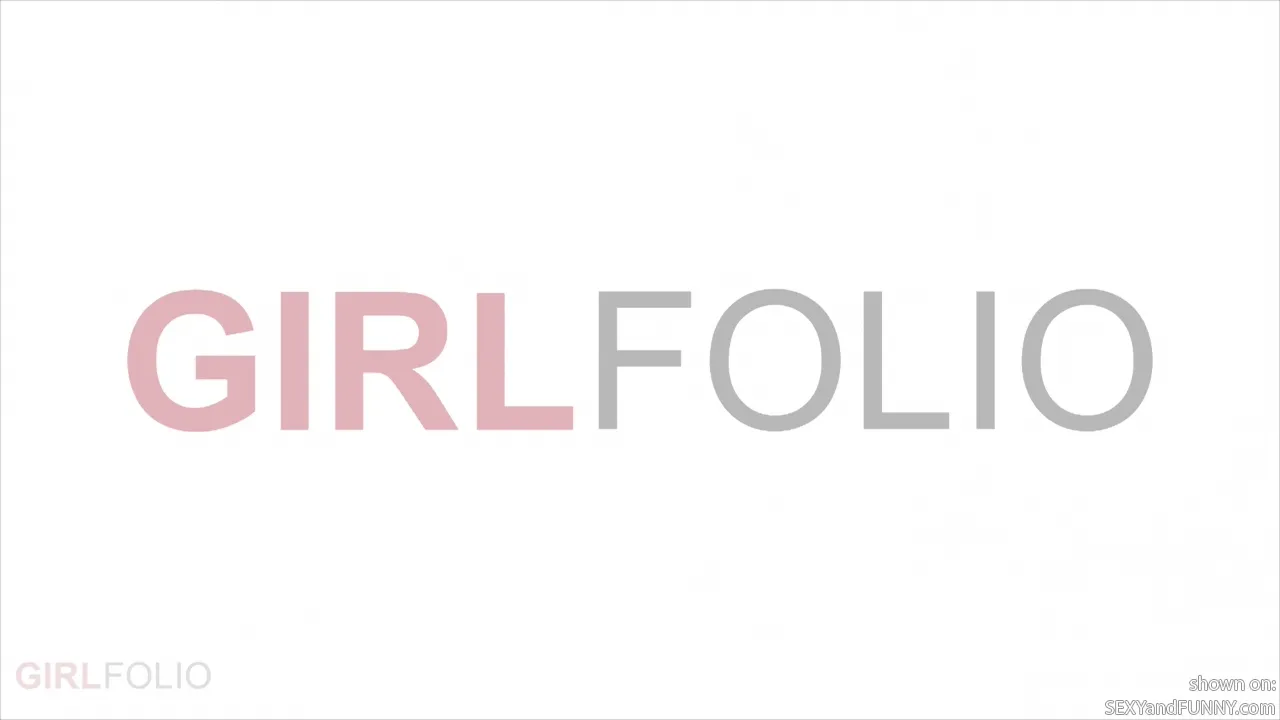 Bridget Playing with a Feather