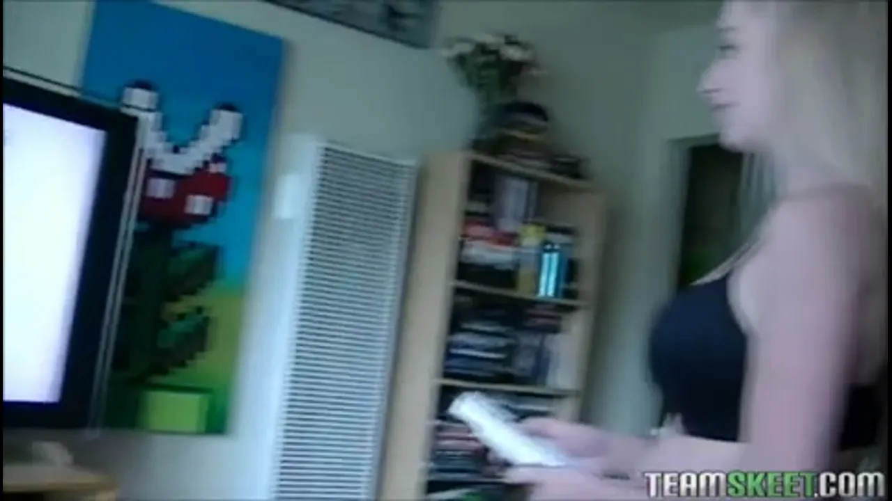 Fun Blonde Strips While Playing Video Games