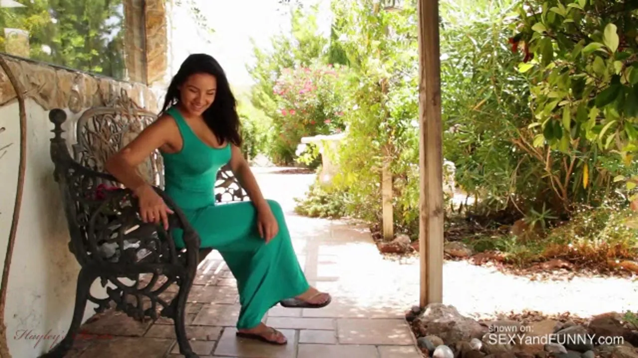 Lacey Banghard Strips Next to a Bench