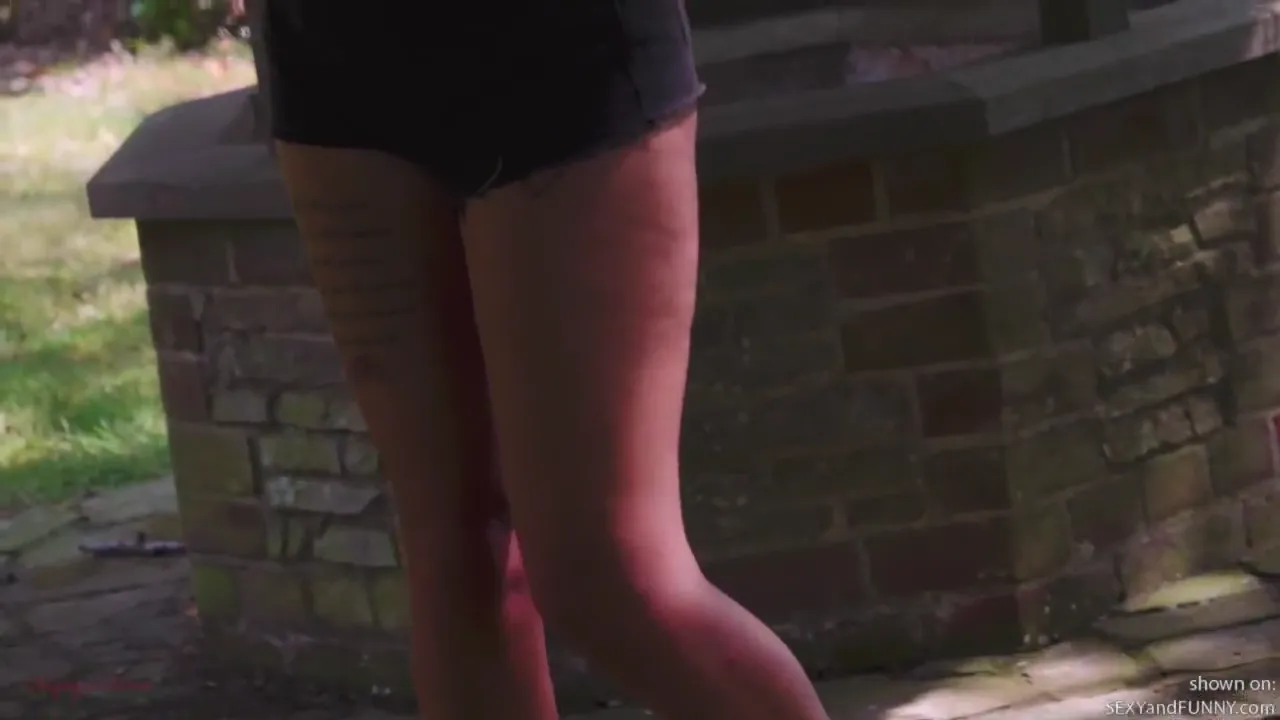 Lauren Unties her shirt