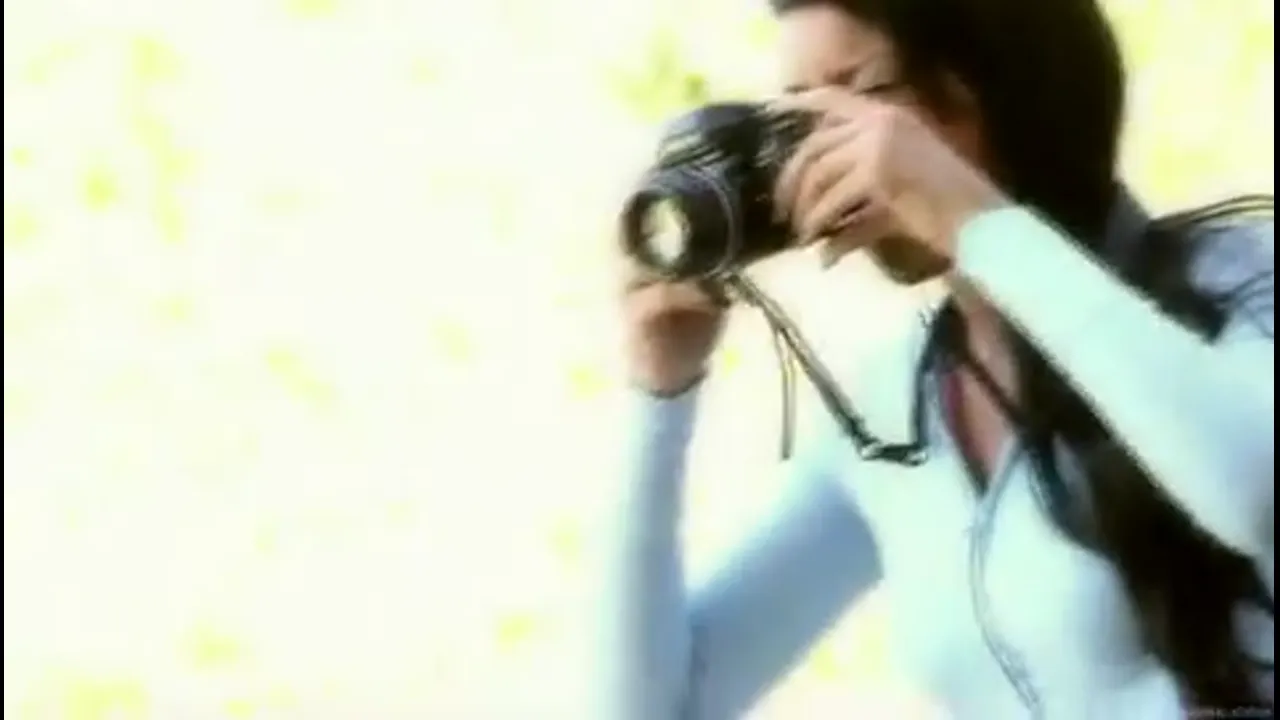 Rihanna Strips While Taking Photos