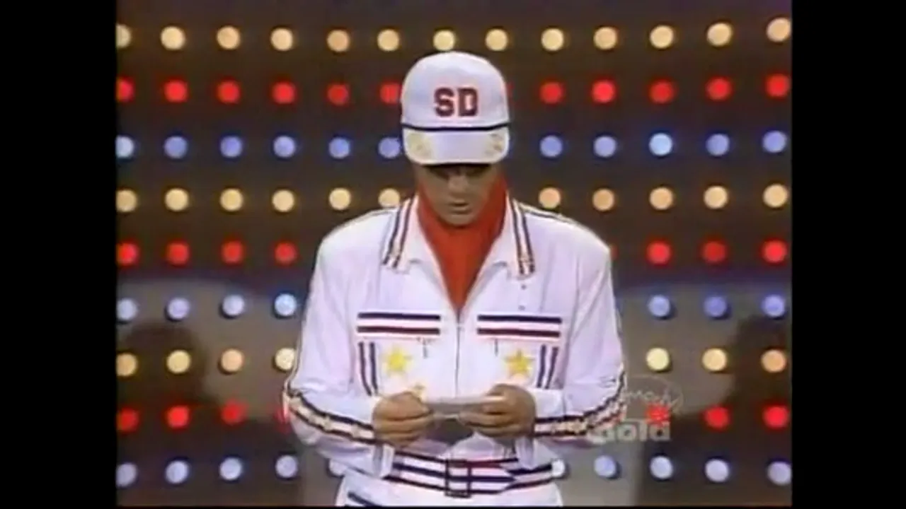 Super Dave Osborne with a Bikini Model